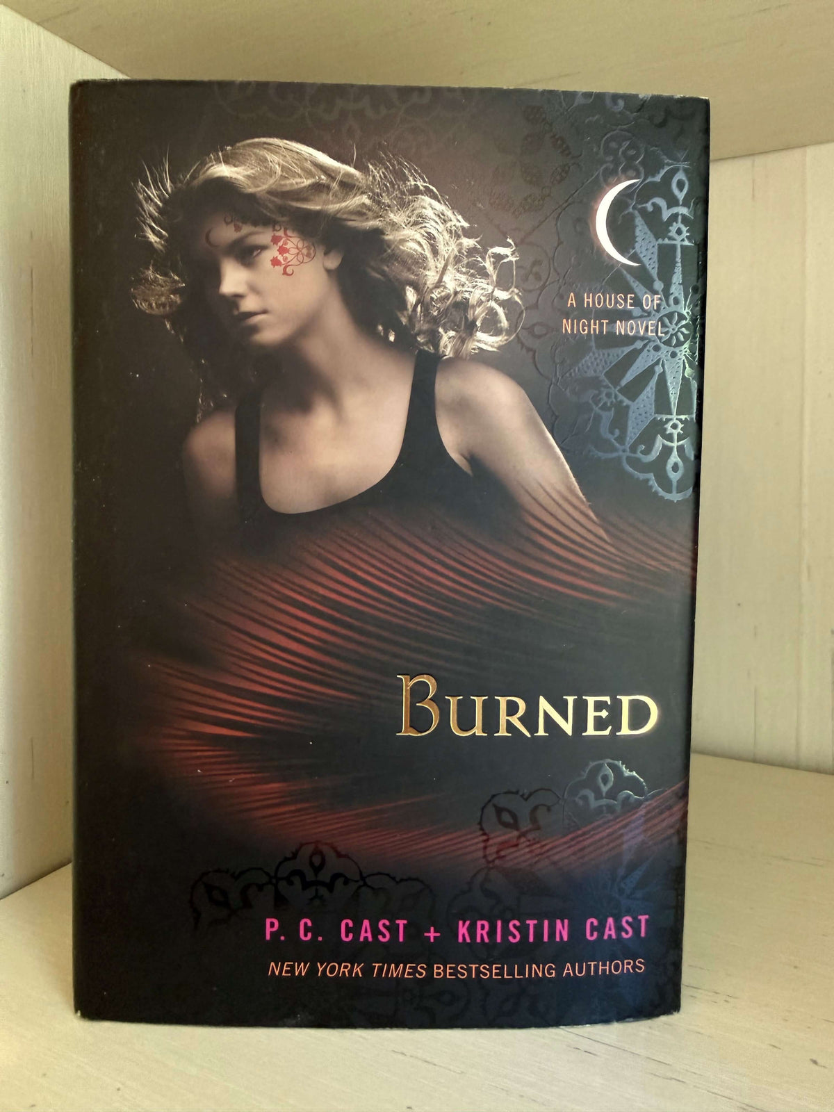 The book cover of 'Burned' by P. C.
