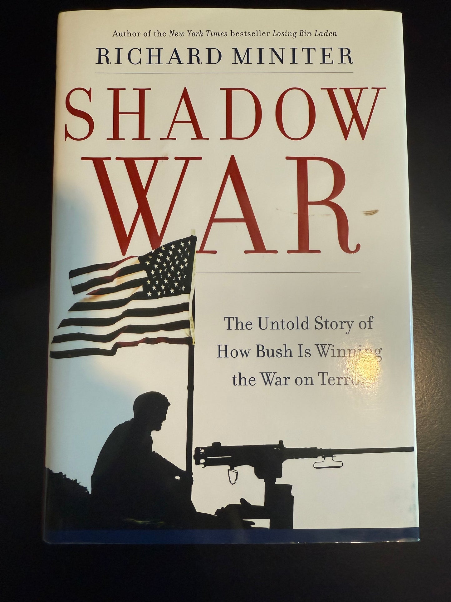 Book cover of 'Shadow War' by Richard Miniter on a dark background