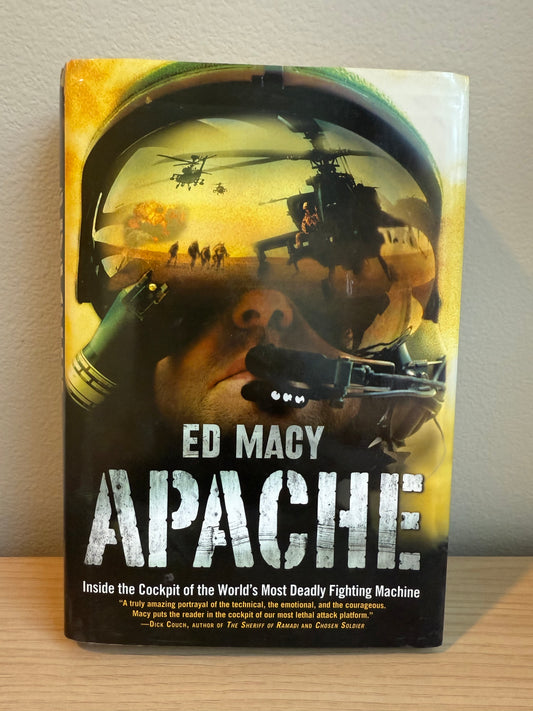 Book titled 'Apache' by Ed Macy on a flat surface