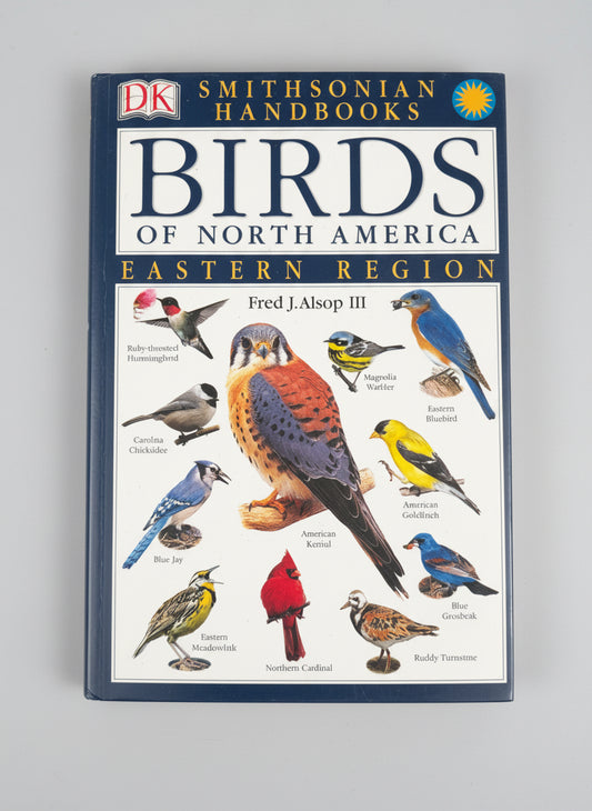 Book titled 'Birds of Eastern North America' by DK on a black background