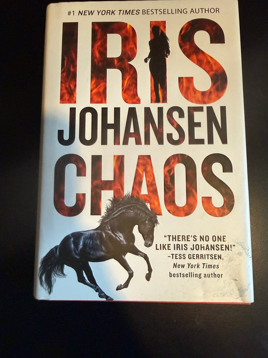 Book titled 'Chaos' by Iris Johansen with a horse illustration on a dark background