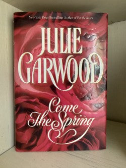 Book cover of 'Come the Spring' by Julie Garwood with a red and white design.