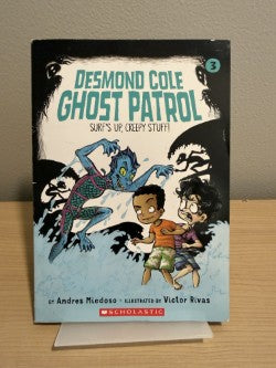 Book titled 'Ghost Patrol' by Desmond Cole on a stand with a gray background