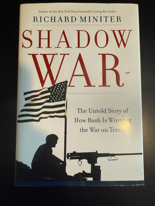 Book cover of 'Shadow War' by Richard Miniter on a dark background