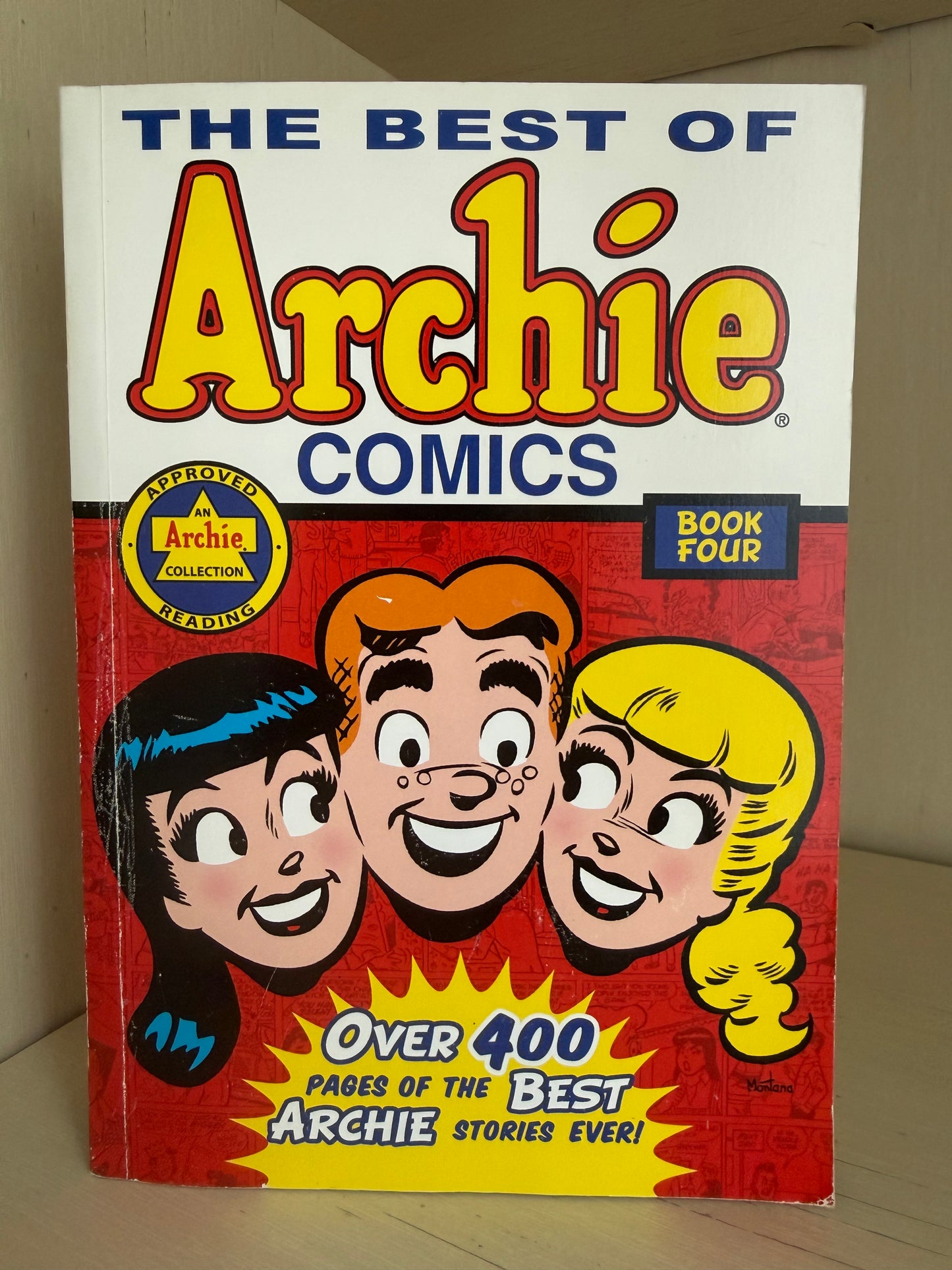 The Best of Archie Comics Book Four paperback novel, featuring classic Archie characters on the cover against a red and white comic-style background.