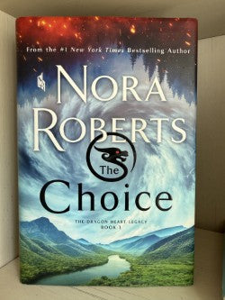 Book cover of 'The Choice' by Nora Roberts with a scenic design.