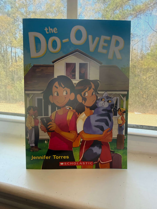 Book cover of 'the Do-Over' by Jennifer Torres on a windowsill.