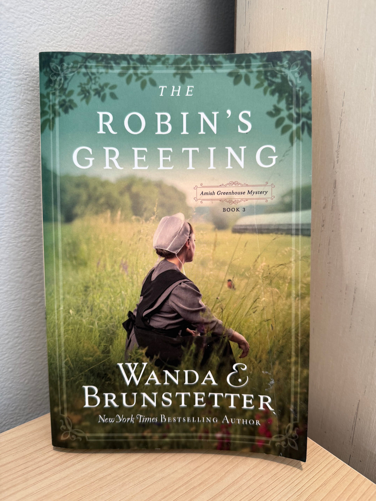 Amish woman sitting on cover