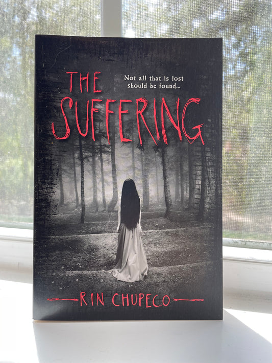 *USED* The Suffering by Rin Chupeco